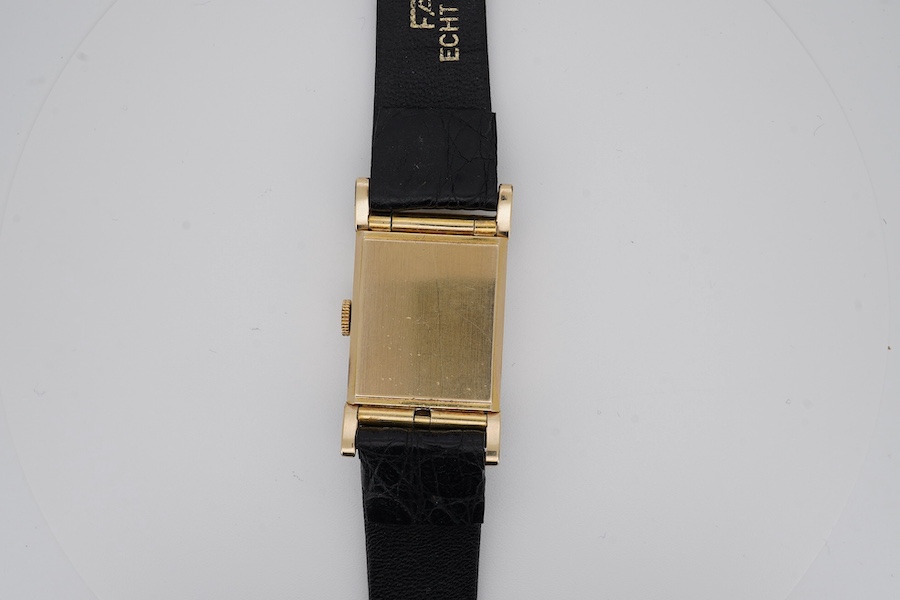 A gentleman's 10k gold filled Bulova manual wind wrist watch, with Arabic dial and subsidiary seconds, case diameter 22mm, on a later associated leather strap. Condition - fair to good.